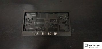 Рамка номерного знака&nbsp;USA с надписью и логотипом "Jeep" черная - надпись: белого&nbsp;цвета. 0731 фото