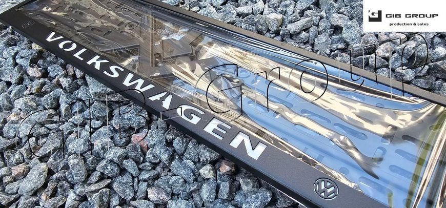 Рамка номерного знаку з написом і логотипом "VOLKSWAGEN" чорна порошкова фарба, напис: білого кольору 16054/L фото
