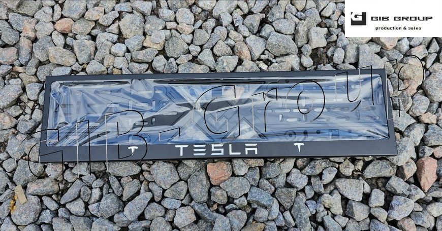 Рамка номерного знаку з написом і логотипом "Tesla" чорне порошкове фарбування, напис: кольору хром 16061 фото