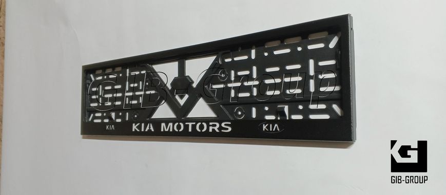 Рамка номерного знаку з написом і логотипом "KIA MOTORS" чорна порошкова фарба, напис: білого кольору 16058 фото