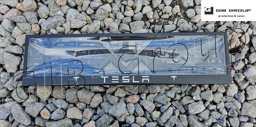 Рамка номерного знаку з написом і логотипом "TESLA" чорна порошкова фарба, напис: білого кольору 16061 фото