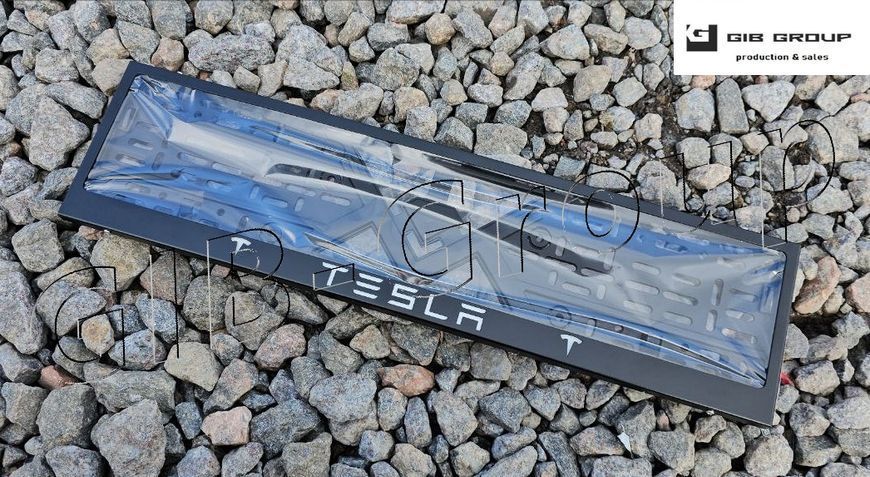 Рамка номерного знаку з написом і логотипом "TESLA" чорна порошкова фарба, напис: білого кольору 16061 фото