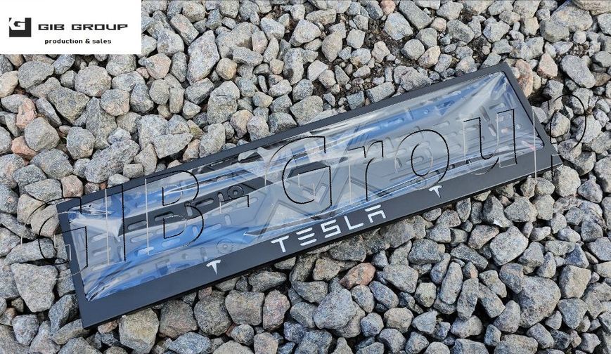 Рамка номерного знаку з написом і логотипом "TESLA" чорна порошкова фарба, напис: білого кольору 16061 фото