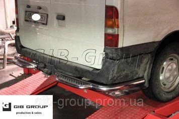 Защита заднего бампера (одинарная нержавеющая труба - одинарный ус) Ford Transit (06-15) B1-27.6 фото