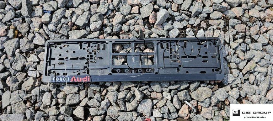 Пластикова рамка номерного знаку з друкованим написом "Audi" 16810 фото
