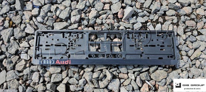 Пластикова рамка номерного знаку з друкованим написом "Audi" 16810 фото