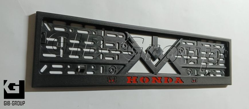 Рамка номерного знаку з написом і логотипом "HONDA" чорна порошкова фарба, напис: червоного кольору 16057 фото