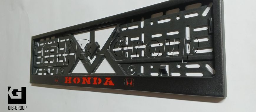 Рамка номерного знаку з написом і логотипом "HONDA" чорна порошкова фарба, напис: червоного кольору 16057 фото