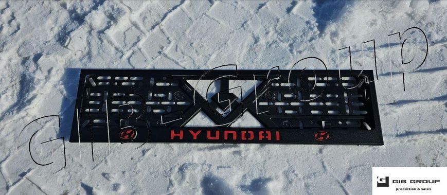 Рамка номерного знаку з написом і логотипом "HYUNDAI" чорна порошкова фарба, напис: червоного кольору 16062 фото